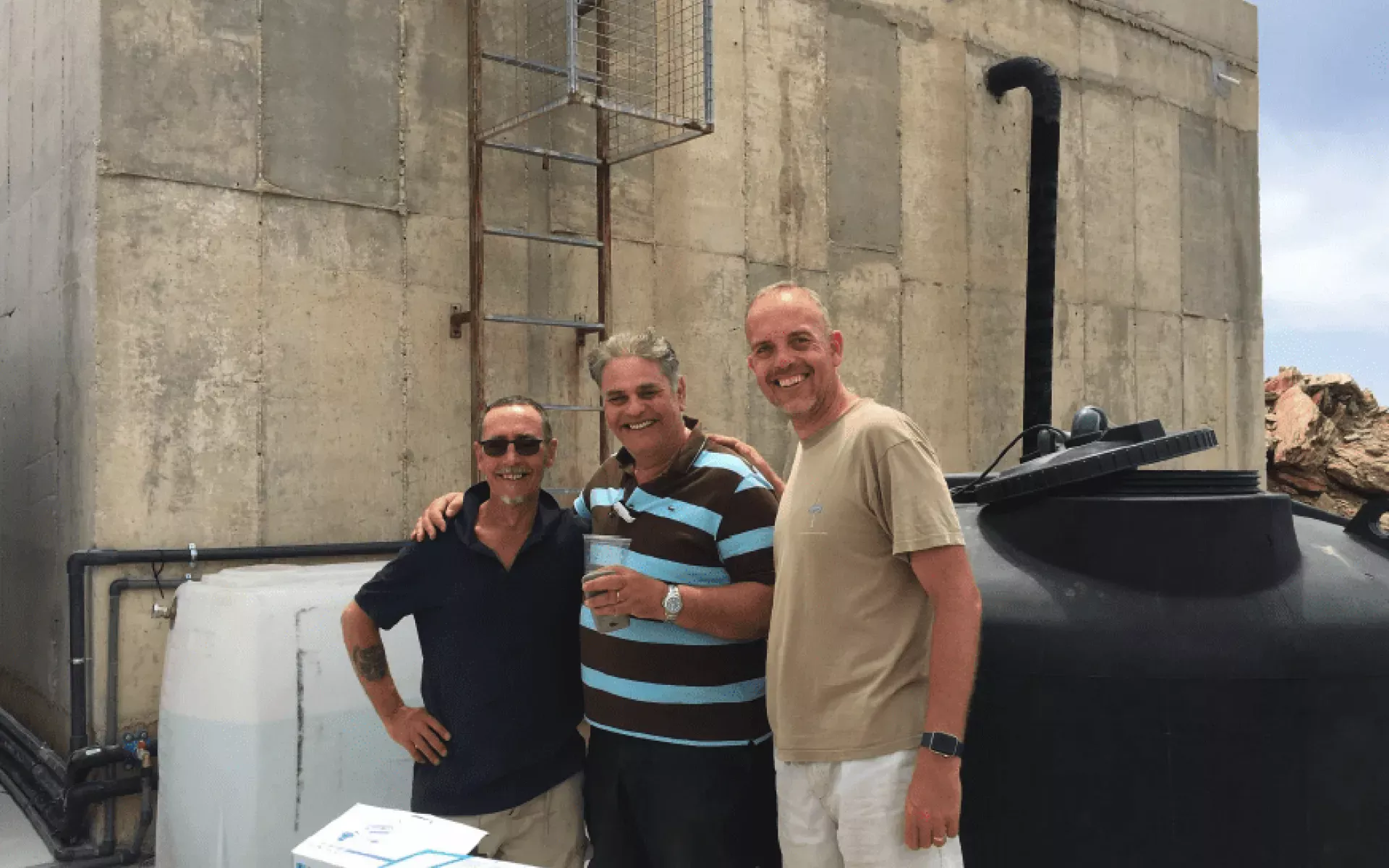 Paqua team with customer at Icaros Village, Evia Island, Greece